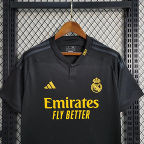 "Camisa Real Madrid Away II 23/24 - Torcedor Masculina Preta e Amarela - Netmantos"